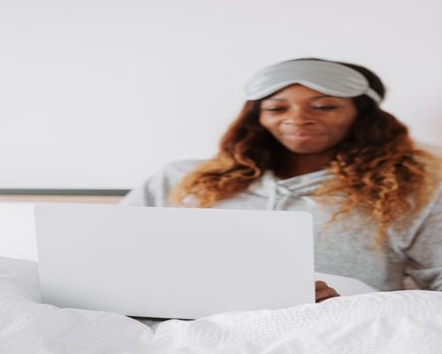 person resting eyes from laptop screen
